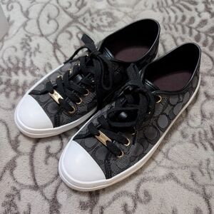 Coach Women's Sneakers in Black and Gold